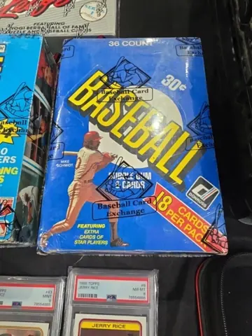 Vintage baseball trading-card packs on display